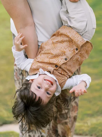 Letting kids be kids is my secret to getting the most genuine expressions. Forget stiff poses; we'll run, play, and even hang upside down to capture the wild and wonderful spirit of childhood.
