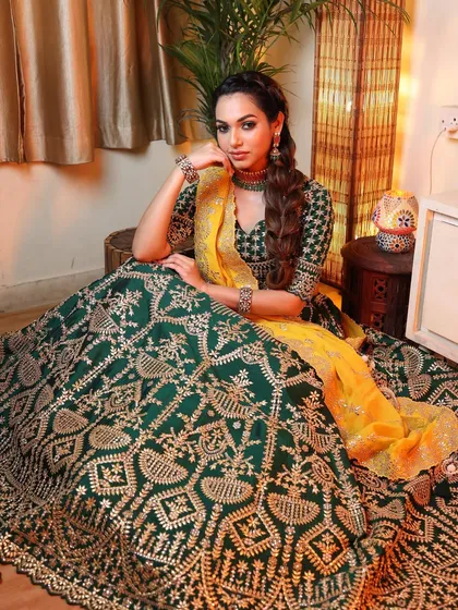 This look is all about attitude. The combination of the bold makeup, unique hairstyle, and stunning outfit creates a truly unforgettable impression.