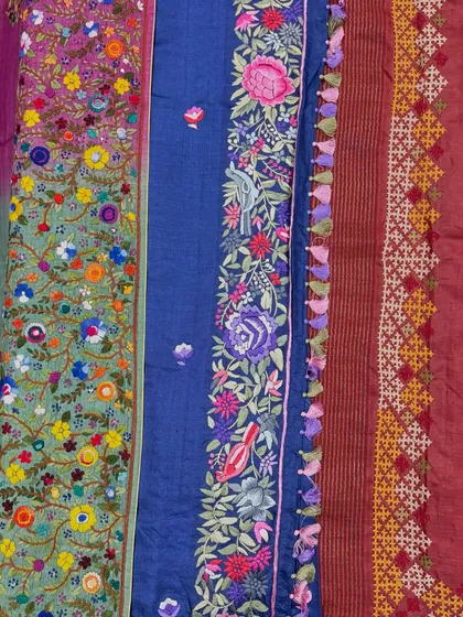 This is a glimpse into the vibrant palette and diverse textures I work with. From the rich florals of Kutch work to the geometric precision of Kasuti, I use a wide range of traditional embroidery techniques to bring your vision to life on fabric.