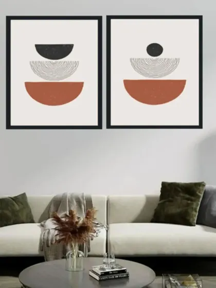 This set of two abstract geometric prints offers a balanced composition of semi-circles and dots in an earthy color palette. The minimalist design is perfect for creating a calm and contemporary atmosphere.