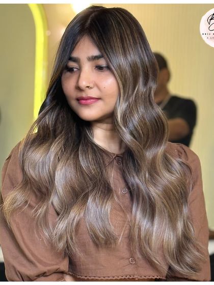 A closer look at the beautiful ash blonde tones that make this hair transformation so striking.