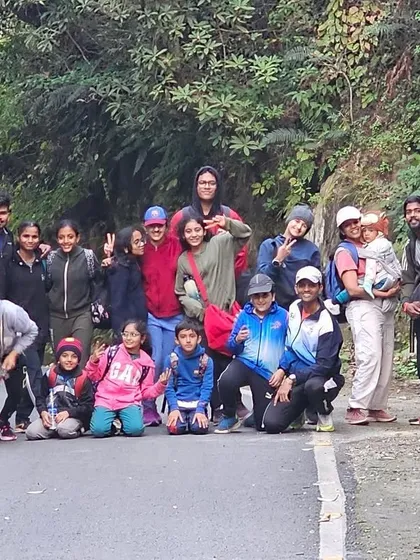 The whole team together on a mountain road during our high-altitude training. These shared experiences in challenging environments create an unbreakable team bond.