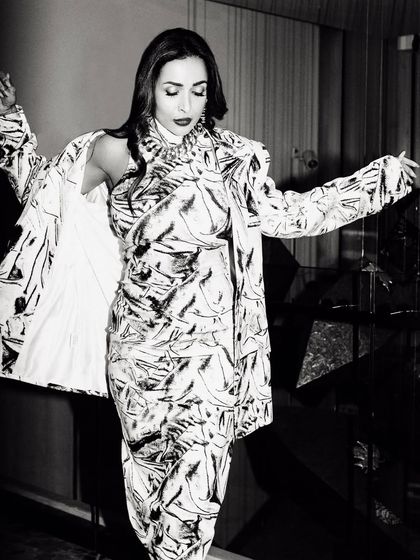 A similar pose, capturing another moment of fluid movement. I often take a series of shots like this to find the one that feels most alive.