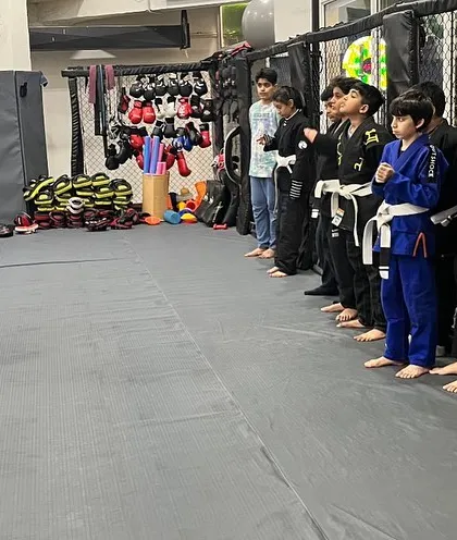 Discipline starts here. Our Little Warriors line up, ready and focused to learn from their coach. This simple act builds respect, attention, and readiness, which are essential skills for martial arts.