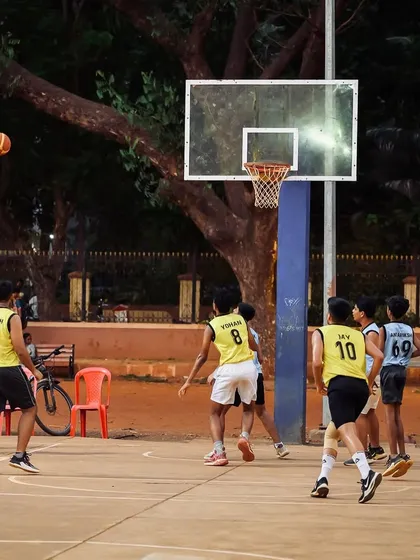 A shot goes up as players from both teams get in position to fight for the rebound.