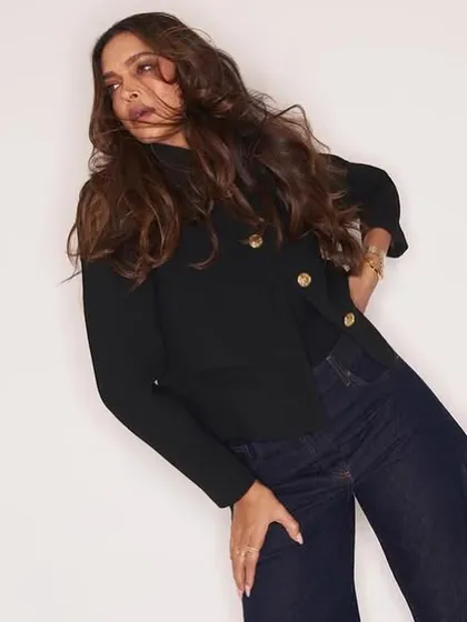 Deepika Padukone looking stunning, with her hands perfectly manicured thanks to my custom press-on nails. A testament to their quality and natural appearance.