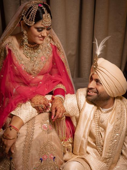 A close-up shot of the couple sharing a loving look, capturing the intimacy and happiness of their wedding day.