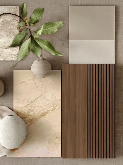 A refined play of textures and tones. This material board captures the calm, grounded essence of our design philosophy, featuring natural stone, warm wood finishes, and soft fabric swatches that reflect our commitment to timeless, earthy elegance.