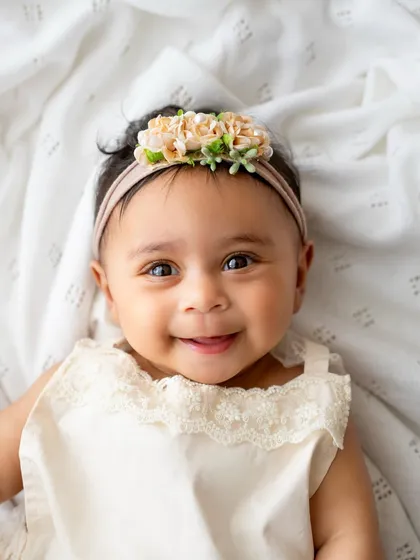 Those big, bright eyes and that sweet smile are what 6-month sessions are all about. I love capturing these simple, beautiful portraits.