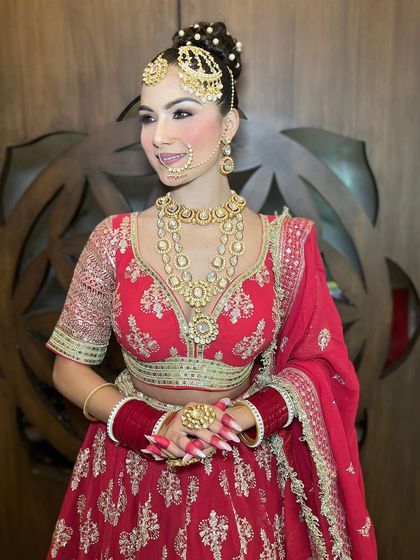 An extensive series of our classic red bridal lehenga. These images capture every detail, from the embroidery to the full bridal styling, providing a complete reference.