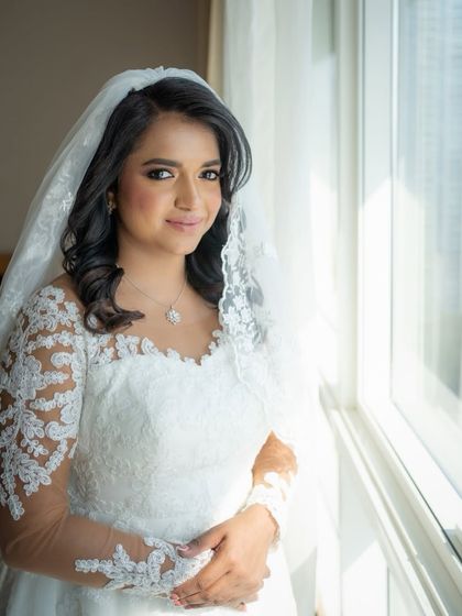 My lovely bride Irene, ready for her white wedding. We chose a soft, graceful makeup look with defined eyes and a natural pink lip, paired with a classic lace gown.