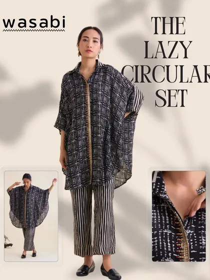 I call this The Lazy Circular Set, for days when you want to feel put-together without trying too hard. It’s crafted in soft cotton silk and pairs an oversized, double-collared shirt with relaxed striped pants. The intricate hand embroidery adds that special touch of artistry.