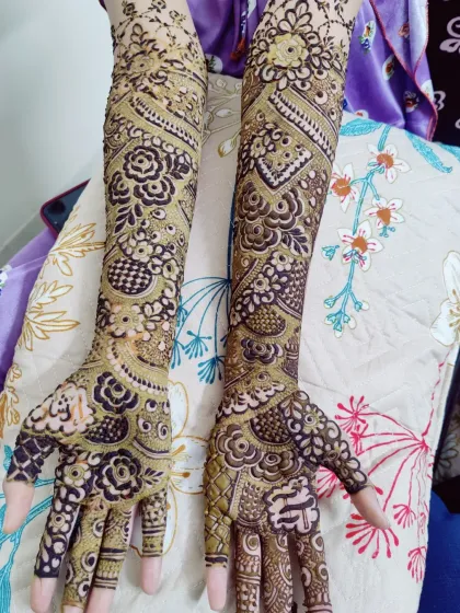 A unique bridal design where each arm has a different pattern, showcasing versatility in style while maintaining a cohesive floral theme.