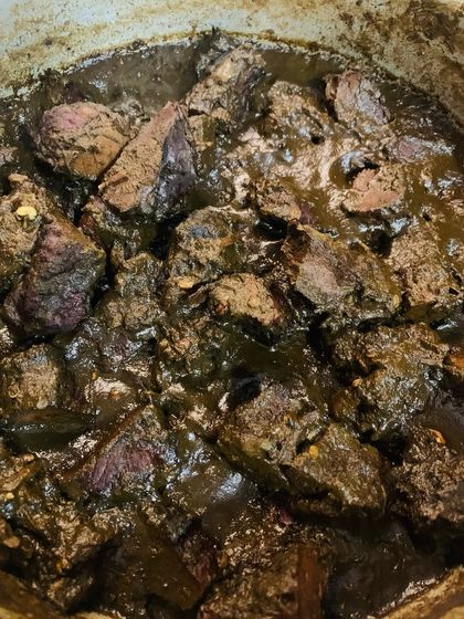 This is my smoked pork prepared with Aneshi, which are dried yam leaves. The dark, rich gravy comes from the Aneshi, bamboo shoot juice, and a blend of king chillies and mingchinga seeds.