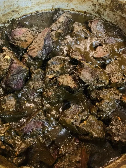 This is my smoked pork prepared with Aneshi, which are dried yam leaves. The dark, rich gravy comes from the Aneshi, bamboo shoot juice, and a blend of king chillies and mingchinga seeds.