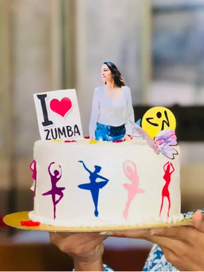 Look at this amazing custom cake. It perfectly captures my love for dance and Zumba.