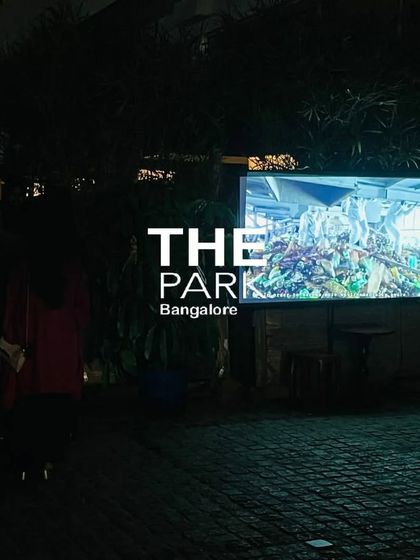 An outdoor screen displays nature imagery during Earth Hour, reminding us of the beauty of the planet we are working to protect.