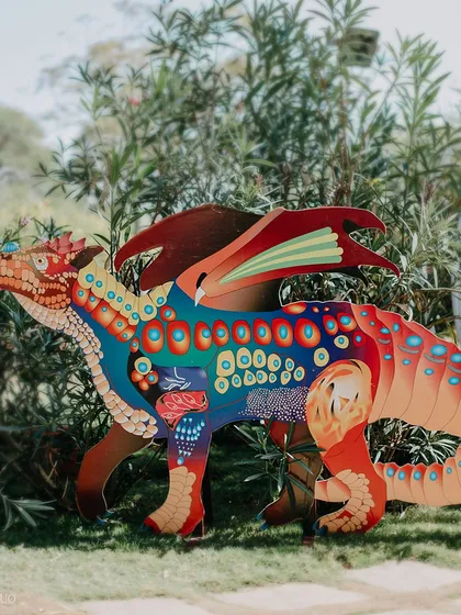 Another fantastical creature installation. This colorful, patterned dragon added to the surreal and artistic decor of the music festival-themed luncheon.