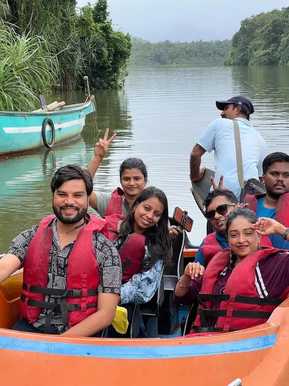 A group enjoying a boat ride in Honnavara.