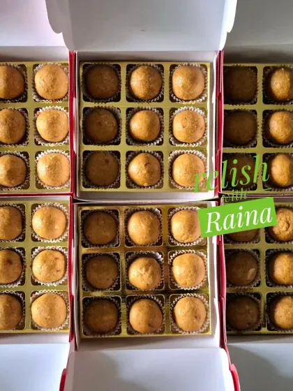 Besan Laddoos packed in golden-tray boxes for a more premium look for Ganpati gifting.