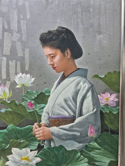 A serene portrait of a woman in a kimono amidst lotus flowers, a piece that reflects the delicate and rich artistic traditions of Japan.