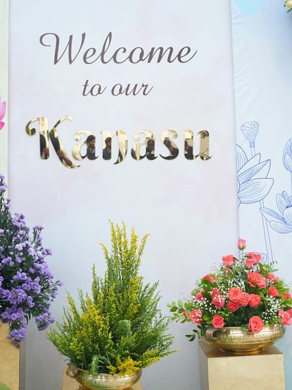 Welcome to "Kanasi," which means "dream" in Kannada. I designed this beautiful floral entrance for a housewarming ceremony to celebrate a family's dream come true moment of moving into their new home.