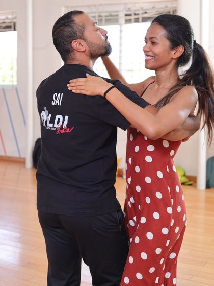 A candid moment of two dancers enjoying the class. Our studio is a place to make new friends who share your passion for dance.