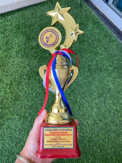 The trophy for Overall Best Lifter. This is the result of a structured training plan and relentless effort.