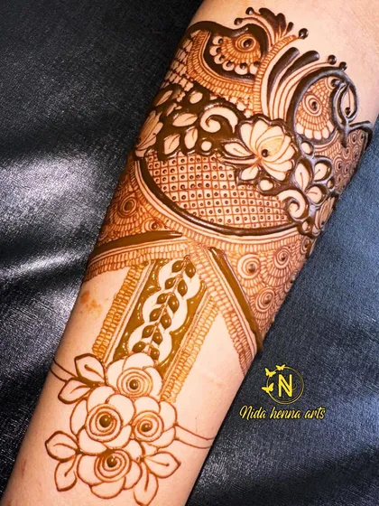 A processing shot of a half finished design. This shows the clean lines and structure of an Indo floral mix pattern before all the filling and shading is complete.