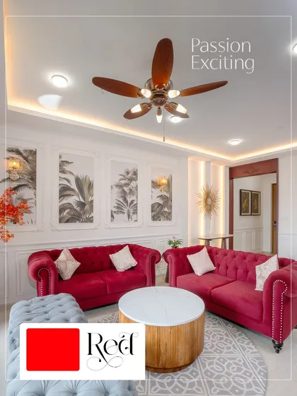 Red is the color of passion and excitement. These bold red Chesterfield sofas create a dramatic and energetic focal point in this living room.