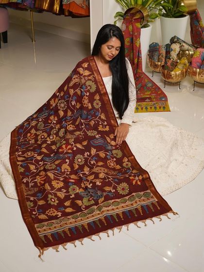 This is a glimpse into my Kalamkari Edition, featuring a wide array of hand-painted dupattas and fabrics from the Indralokam series. Each piece is a unique story, available for you to customize into your dream outfit.