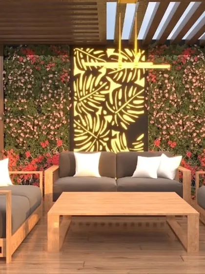 A close-up of the seating area in the same render, showing the comfortable wooden furniture and lush vertical gardens.