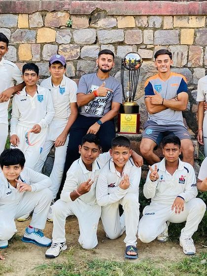 Another group photo of the champion team. The unity and spirit are evident.