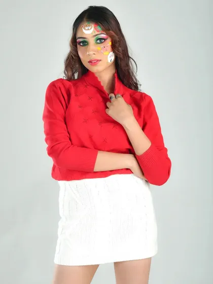 A studio portrait showcasing the complete Christmas look. The bright, festive makeup stands out against the simple background, making it the hero of the image.