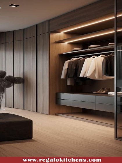 This design integrates the closet directly into the bedroom space, using wood paneling and a glass partition to define the area while maintaining an open, airy feel.