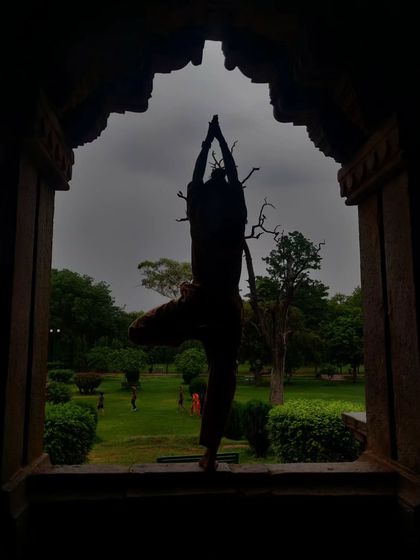Finding my balance with Vrikshasana (Tree Pose) in this beautiful natural frame. Like a tree, yoga teaches us to be rooted yet reach for the sky.