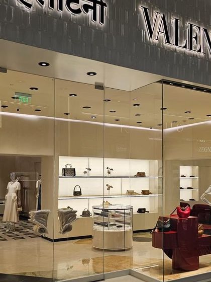 For the Valentino store at Jio World Plaza, we created a facade that speaks the language of minimalist luxury. The clean lines, expansive glass, and iconic branding create an inviting and modern entrance that perfectly aligns with the brand's high-fashion identity.
