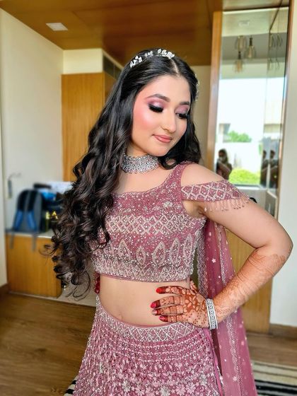 A close-up showing the details of her pink and purple eyeshadow, blended to perfection.