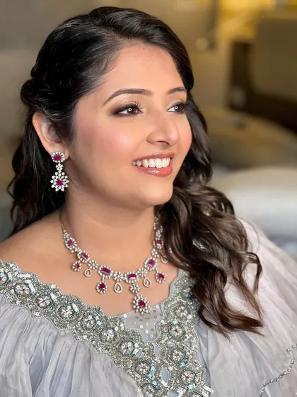 A pretty Roka bride. Her grey and silver outfit was so elegant, and we gave her a soft glam look with a focus on radiant skin and a glossy lip. 💗