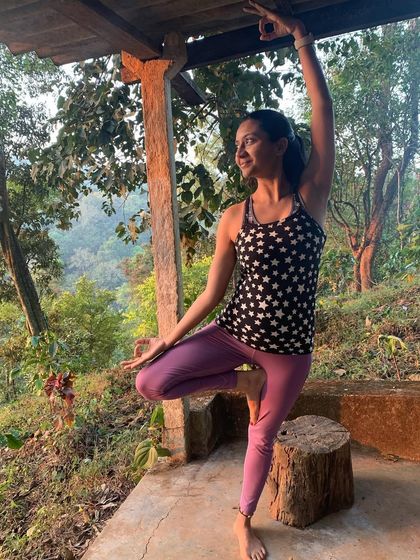 A variation of Tree Pose, finding balance and joy among the trees. Yoga is a daily practice of self-knowledge and self-care for me.