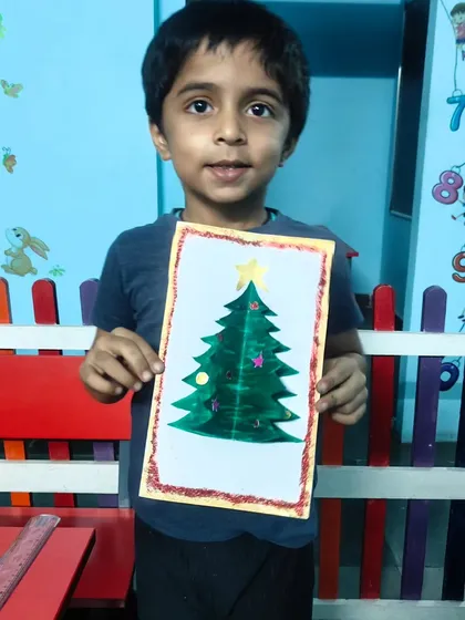 Getting into the holiday spirit with a handmade Christmas tree greeting card. Our festive craft sessions are always a hit with the kids.