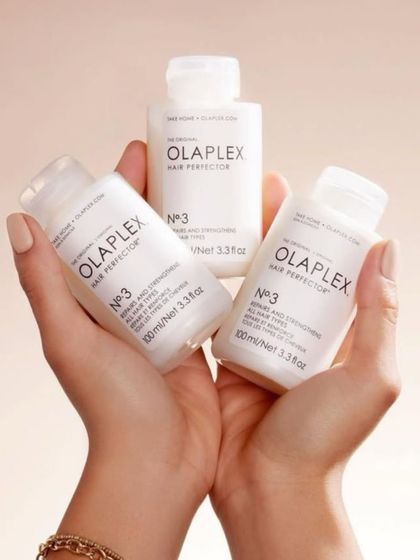 The Olaplex No.3 Hair Perfector is an essential take-home treatment. It's not a conditioner, but a bond-builder that continues the repair process at home, maintaining your hair's strength and integrity between salon visits.