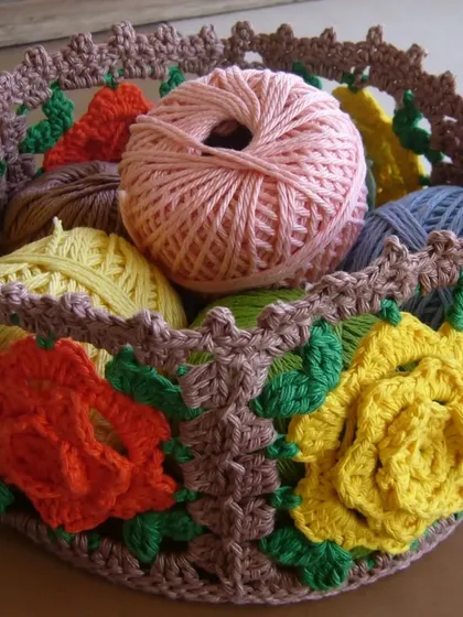 This gorgeous basket is made from individual rose granny squares joined together. It's the perfect, pretty storage for my yarn, but it could be used for anything.