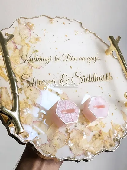 The perfect touch for your engagement day. This custom ring platter is made with flowers from a special memory and can be personalized with your names or even your favorite song lyrics.