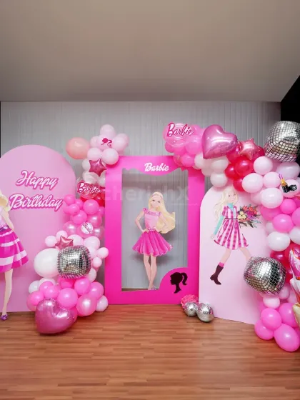 Come on Barbie, let's go party! This glamorous Barbie-themed setup is all about pink, glitter, and fun. It includes multiple backdrops, character cutouts, a life-sized photo frame, and sparkling disco ball balloons for the perfect photo opportunities.