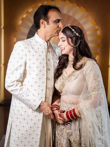 A father's blessing is a truly special moment. I aim to create a look that allows the bride's natural emotions to shine through.