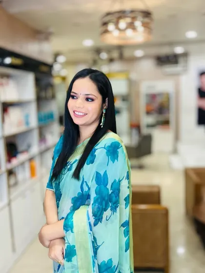 A beautiful smile from a happy client. Her simple and elegant makeup lets her natural beauty shine through.