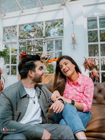 A joyful, laughing shot. The makeup is light and minimal, perfect for capturing genuine moments of happiness.