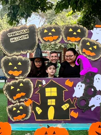 A family of witches and wizards at our Halloween celebration. We cherish these opportunities to bring our school community together.