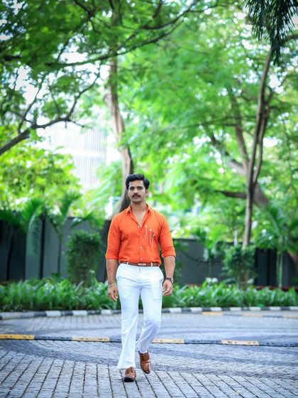 A full-length shot of Rohit's stylish outfit for the awards party. The grooming I provided ensures he looks sharp from head to toe.
